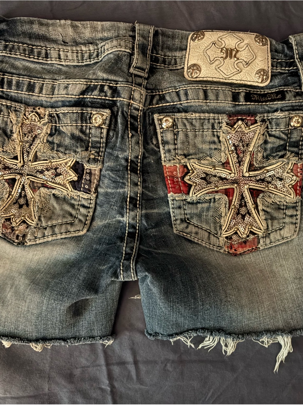 Miss Me Embellished Cross Denim cutoff shorts 26